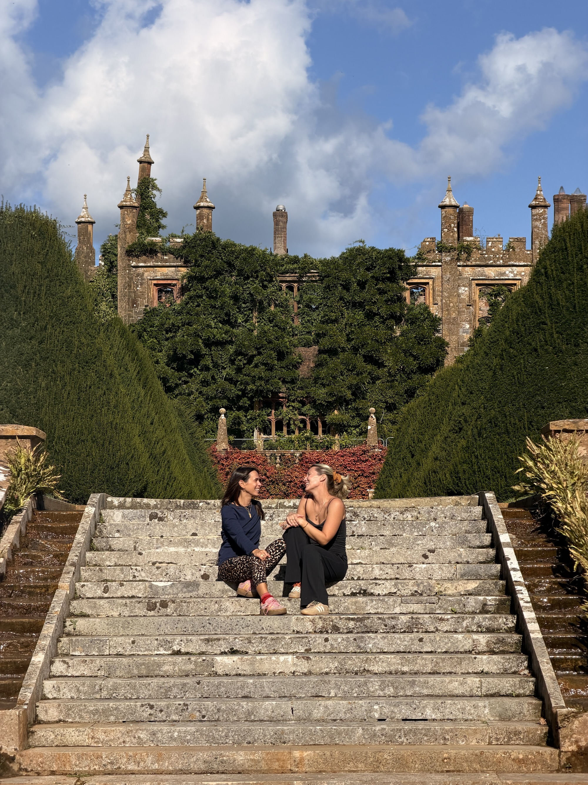 Hannah and Katie on the steps at Parnham Park